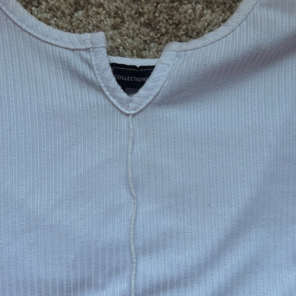 YMI collections, white T shirt. Size small made with Polyester. - Picture 2 of 3